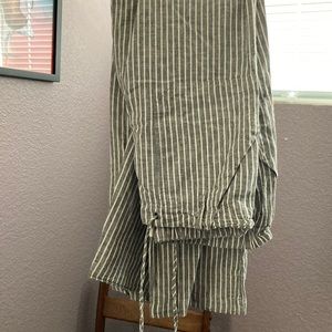 Grey and white pinstripe lightweight pants with drawstring and back pockets